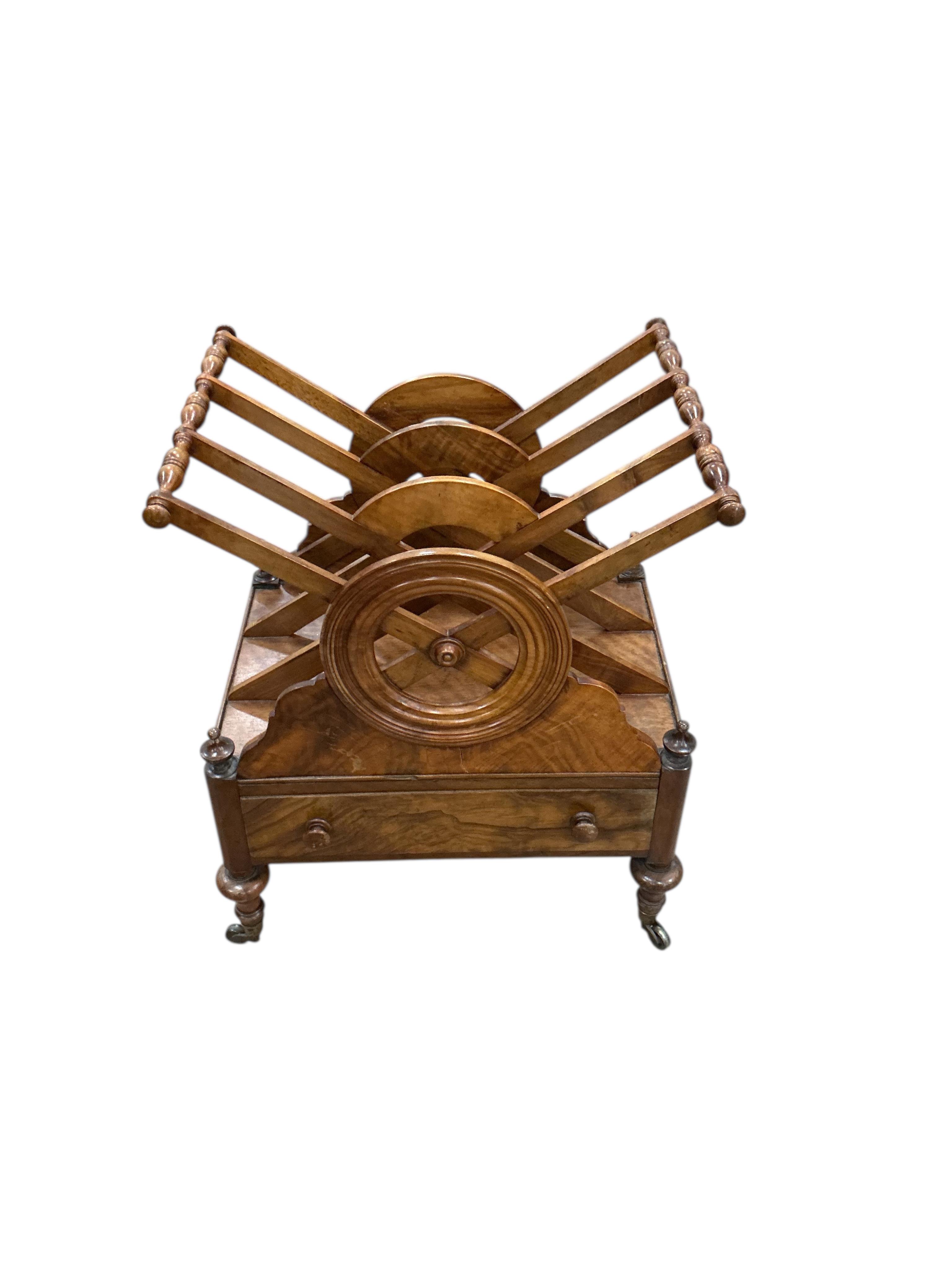An early Victorian walnut three division Canterbury, width 54cm, depth 40cm, height 83cm